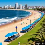Home 19 우루과이 관광 산업 - A vibrant beach scene at Punta del Este, Uruguay, showing a lively atmosphere with young people and ...